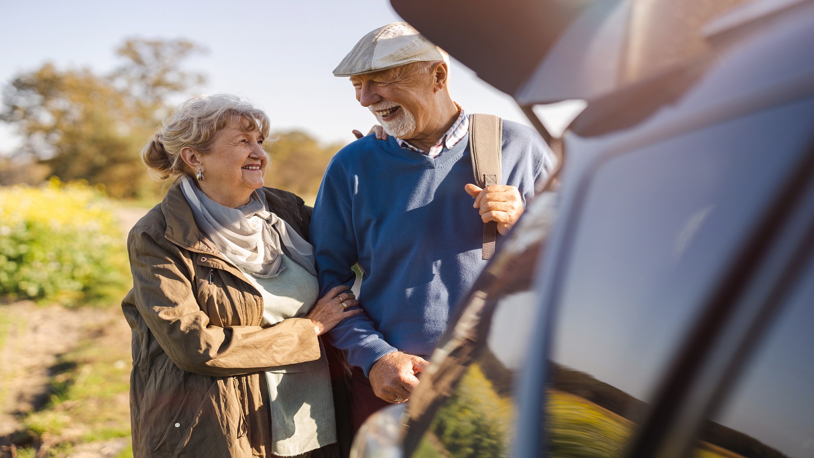 Car Parked Senior Couple