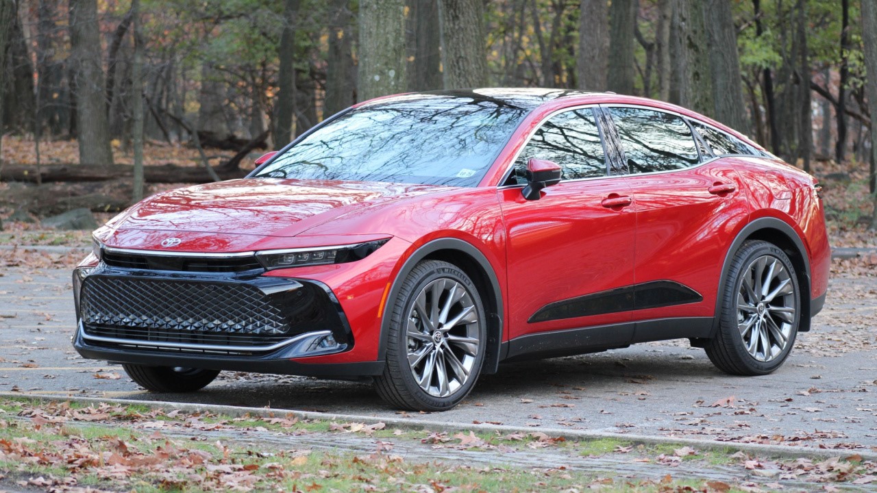 All New Sixteenth generation red Toyota Crown (SportCross) Crossover Hybrid Electric Vehicle (HEV) is a new generation sedan to replace Toyota Avalon