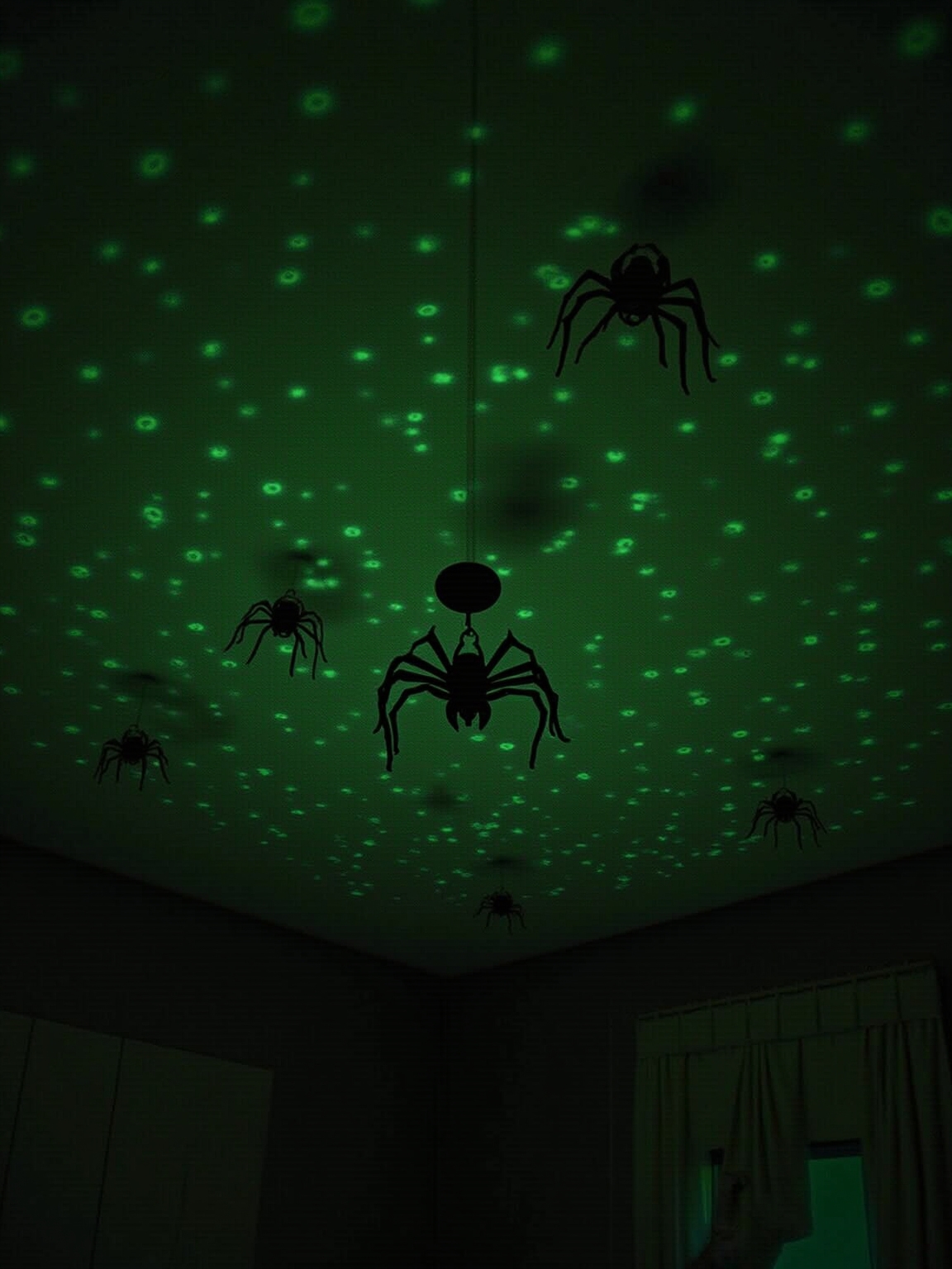 glowing cobwebs and spiders